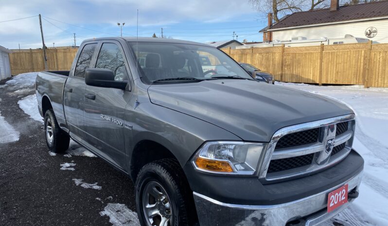 2012 Ram 1500 4WD Quad Cab 140.5″ ST Automatic